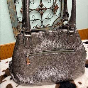 Beautiful Cole Haan silver leather bag. Excellent condition. Soft, luxurious.